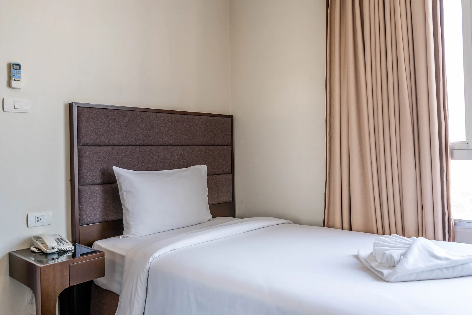 Family staying in 2 bedroom hotel Bangkok with kitchen