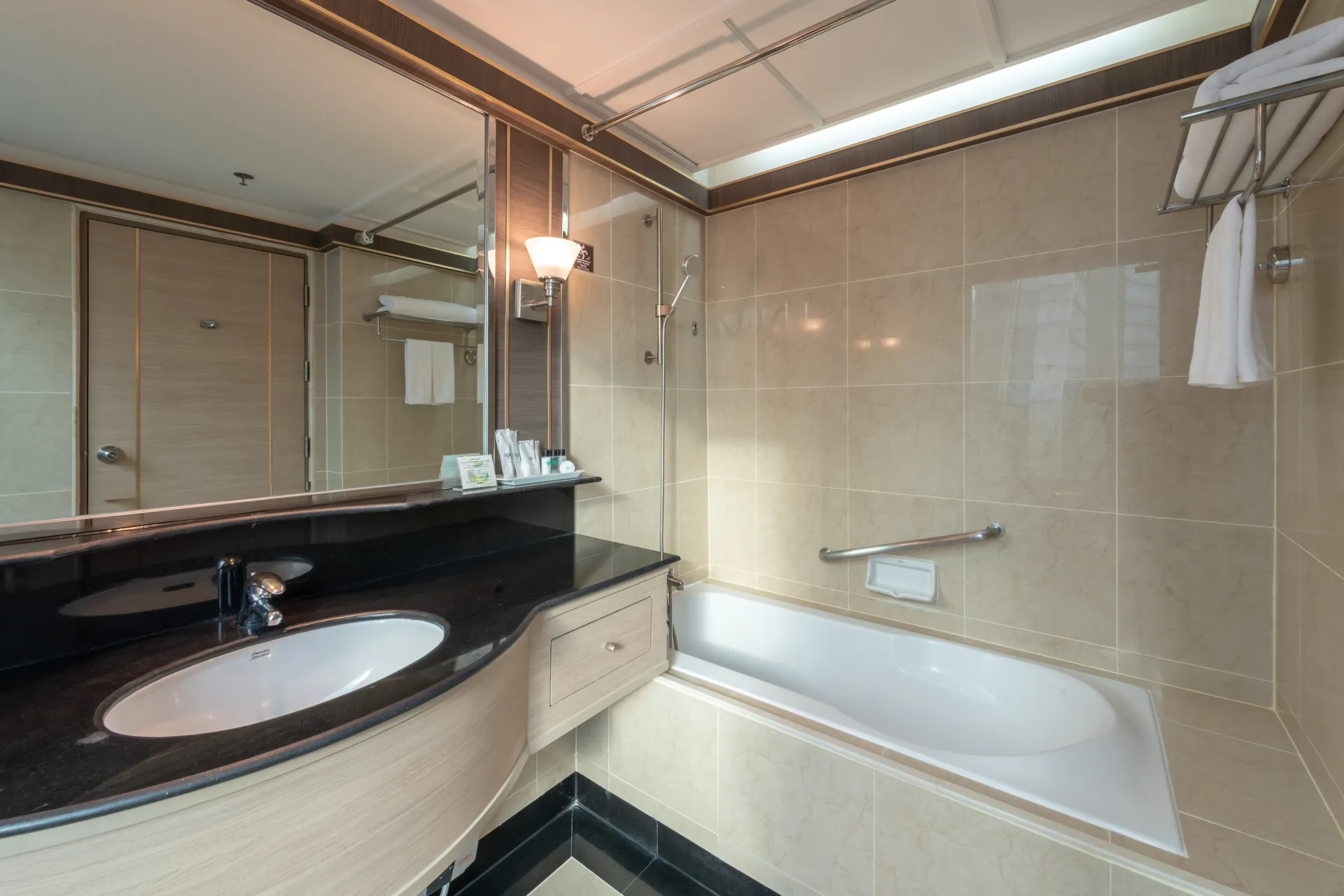 Dining area inside a 2-bedroom suite at a Sukhumvit long-stay hotel.