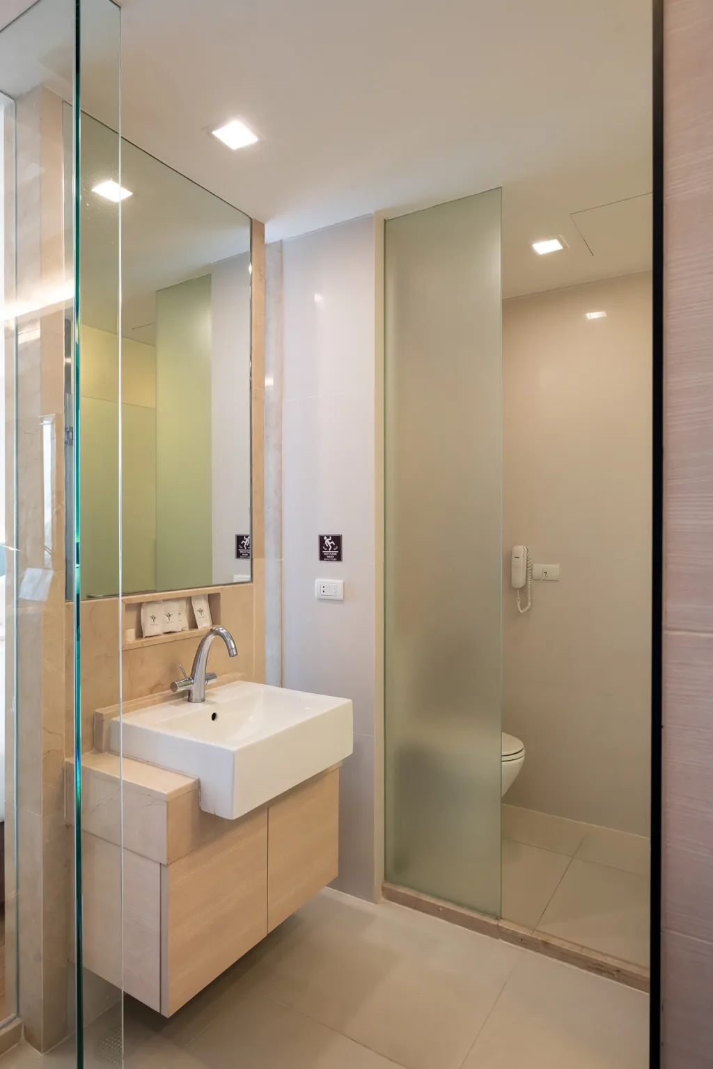 Bangkok hotel room with 2 double beds kitchen.