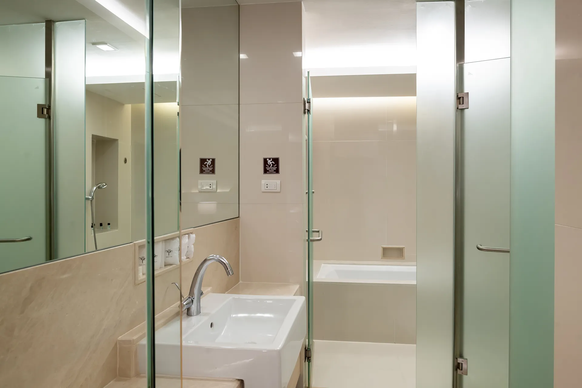 Bangkok skytrain station triple hotel room kitchen.