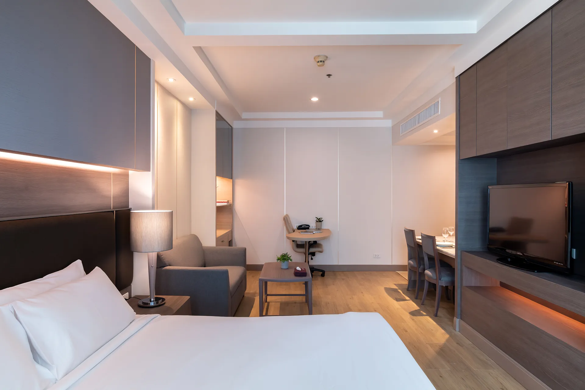 Modern design of a studio with kitchen at a city hotel in Sukhumvit.