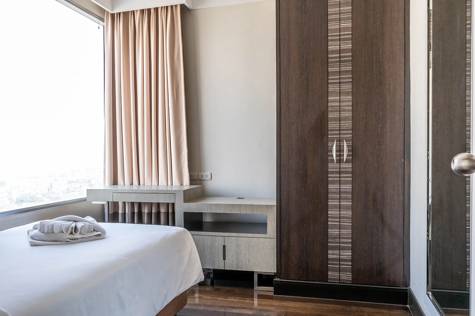 Master bedroom in 2 bedroom family room hotel Bangkok