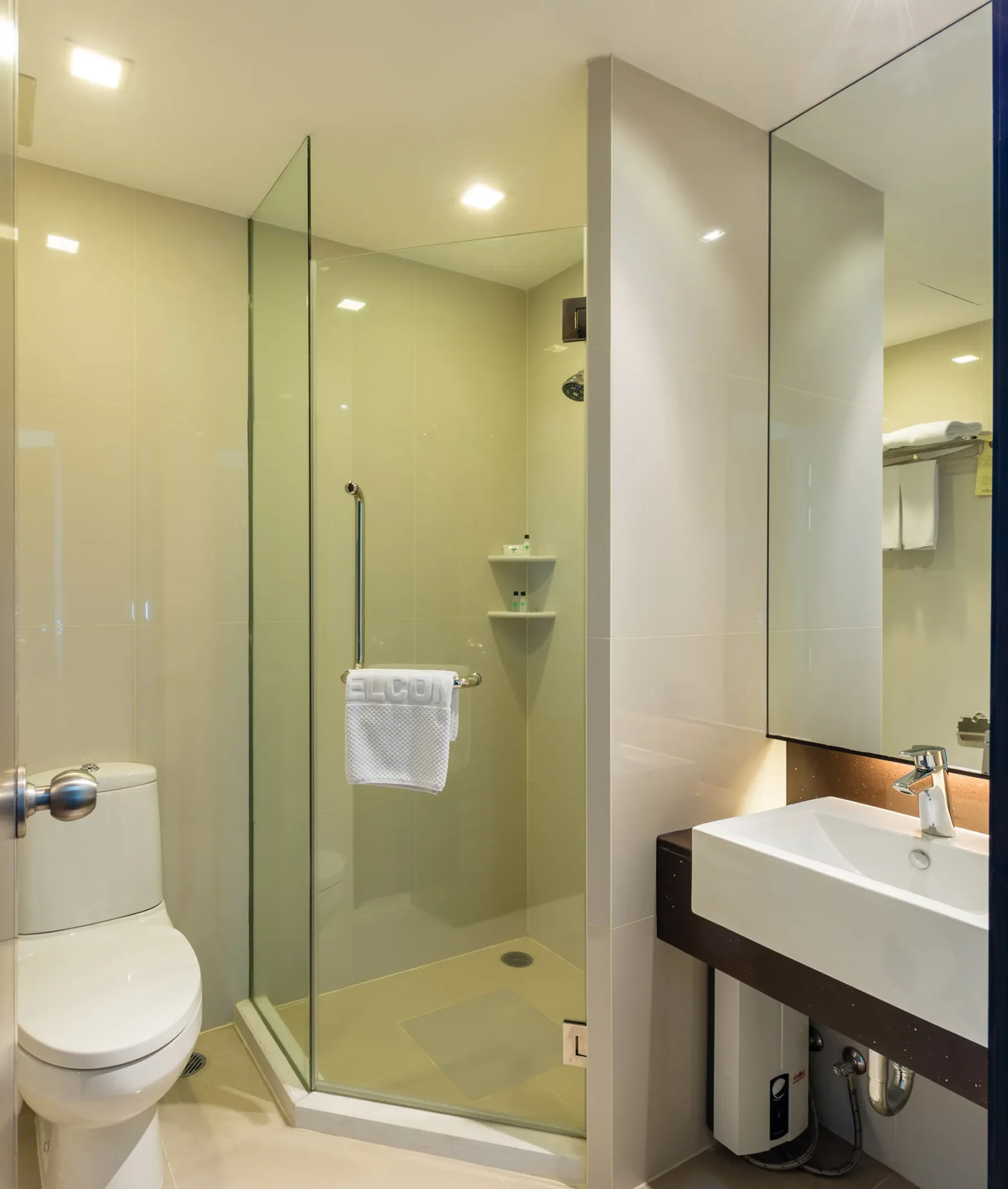 2 Bedroom Suite Bangkok 5-star Family Hotel near bts bedroom with bed.