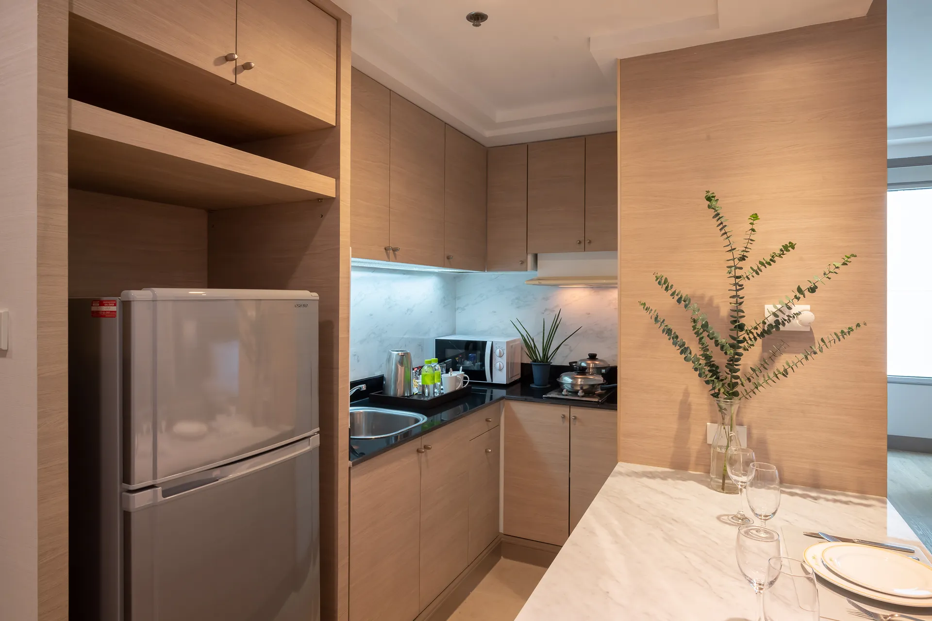 Studio bedroom with kitchen located near MRT Sukhumvit in Bangkok.