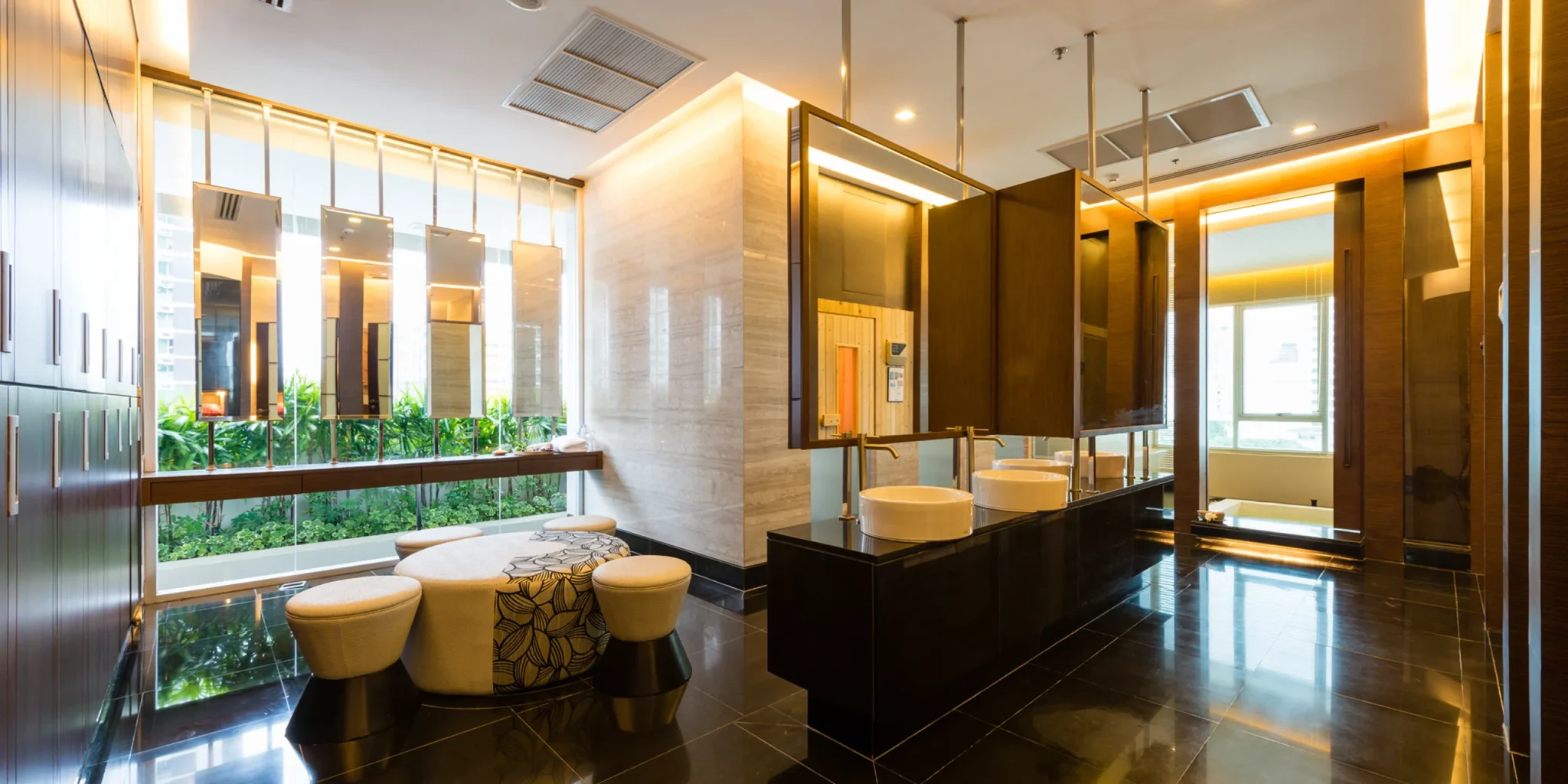 A steam room at a Bangkok hotel with modern wellness facilities.