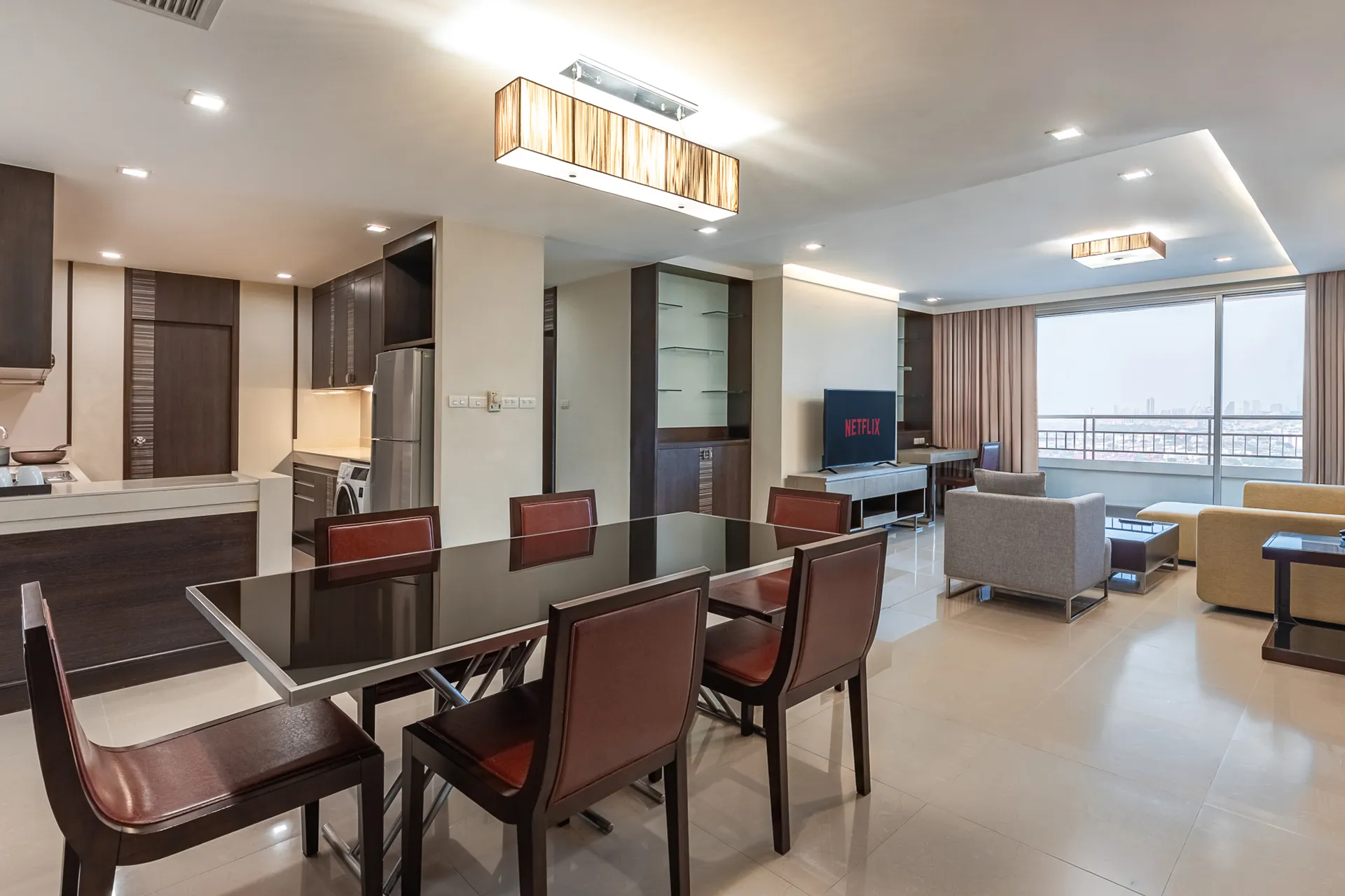 Luxury 3-bedroom serviced apartment in Bangkok with kitchen and city view