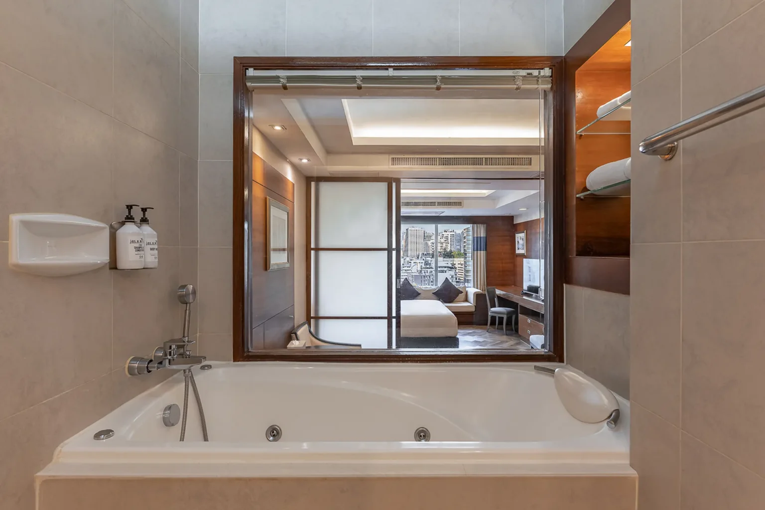 Luxury Sukhumvit hotel suite with jacuzzi and city view
