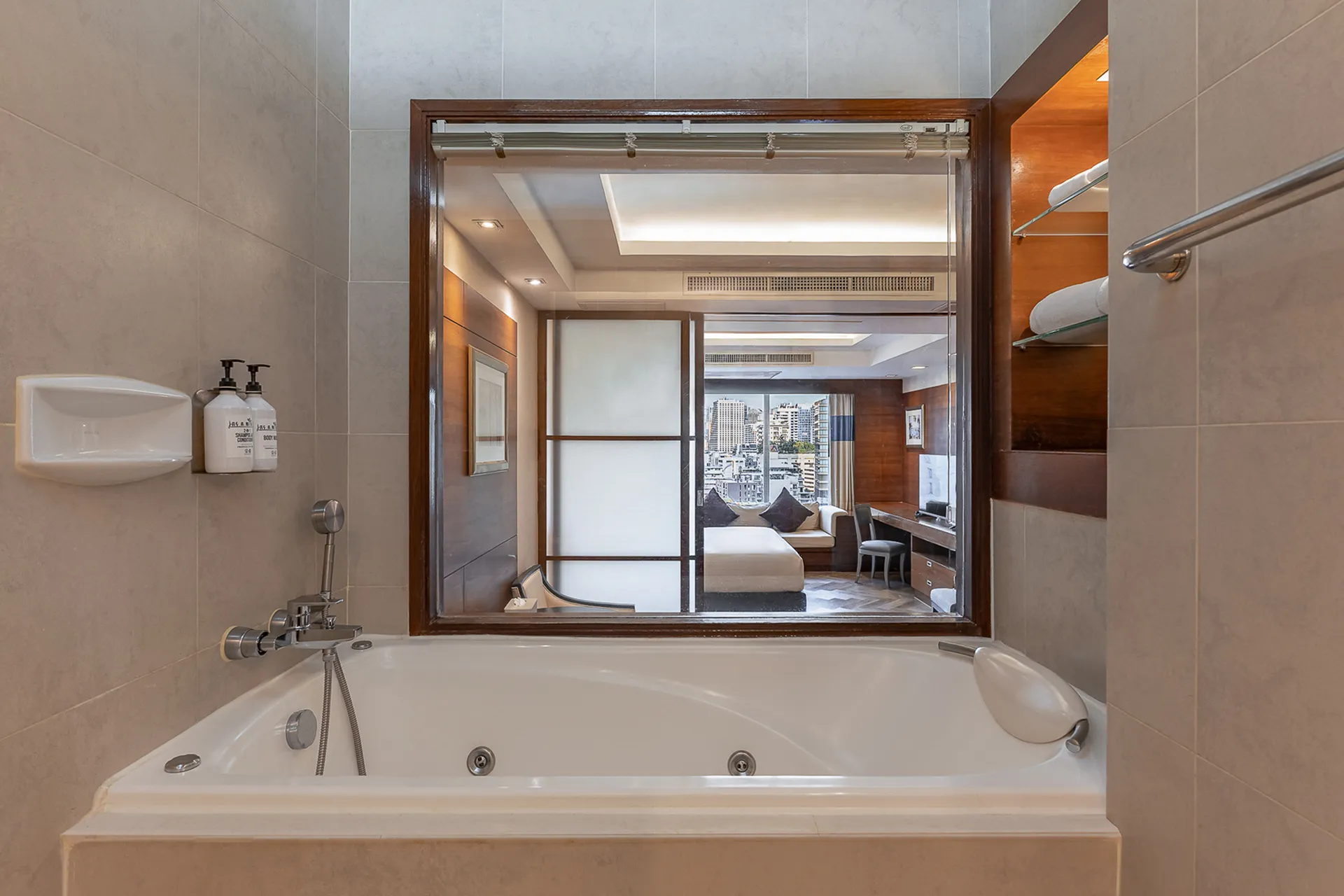 Luxury Sukhumvit hotel suite with jacuzzi and city view