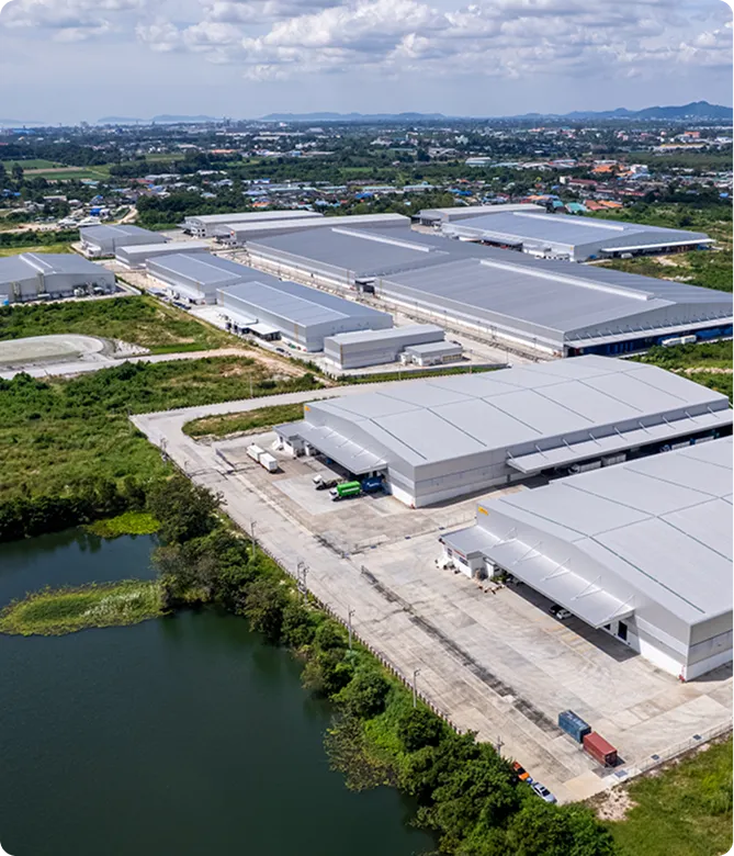 Alt Text: Aerial view of Jasmine Group manufacturing industrial facility representing the origin and heritage before transitioning to hospitality