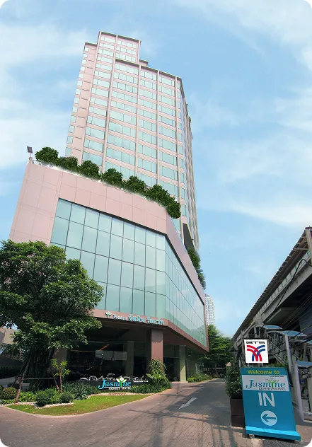 Jasmine Resort Hotel building directly connected to BTS Phra Khanong providing peaceful resort-inspired accommodation in Bangkok
